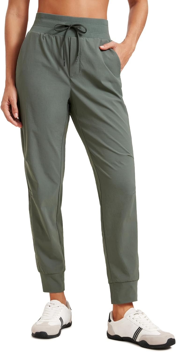 CRZ YOGA Athletic Joggers for Women 27.5″ – Lightweight Travel Outdoor Hiking Pants with Pockets Grey Sage Medium